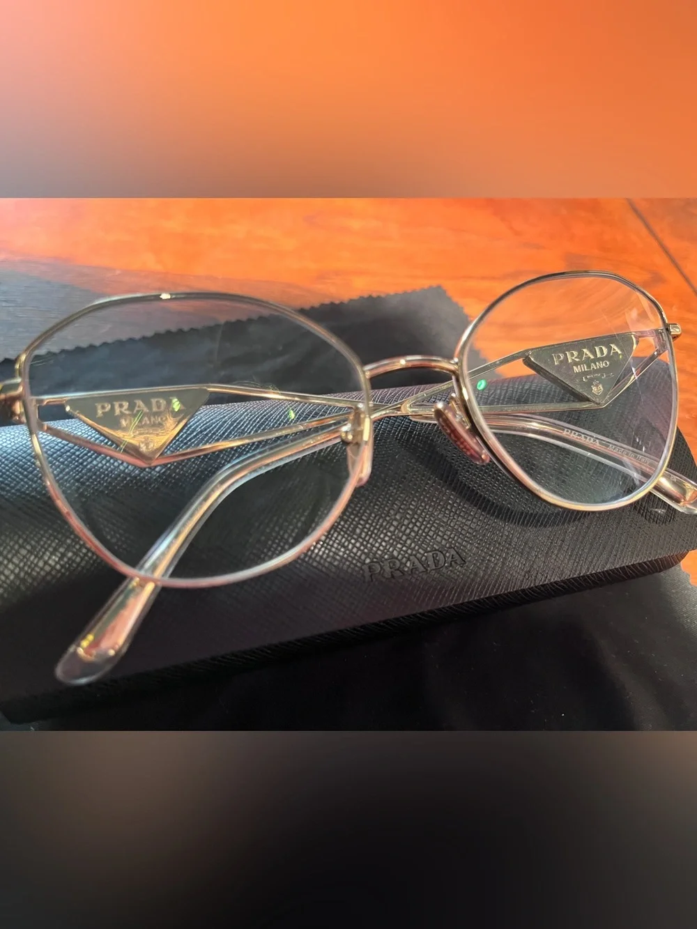 Prada - eyeglass frames - PR 52ZV - pale gold